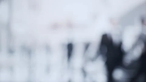 An array of black outlines depicting busy corporate individuals in a chic Stock Footage 249814220