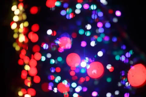 An Array of Blue, Purple and red Bokeh Christmas Lights at the Festival Stock Photos