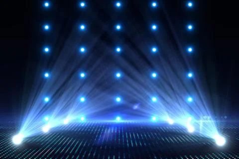 Array of blue spotlights and LED floor lights is glowing on dark performance Foto stock