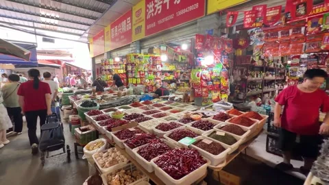 Array of bright spices is displayed at the stalls in the Supo Agricultural Stock-Footage 336746446