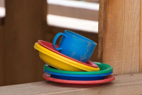 Array of brightly-colored plastic cups and stacked on top of each other Stock Photos