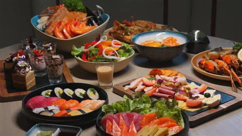 Array of diverse and colorful dishes, including sushi, seafood, salads Stock Footage 280021607