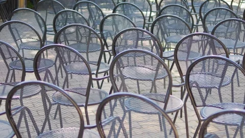 Array of empty chairs set up for an outdoor event, waiting guests in 4k slo.. Stock Footage 267678650