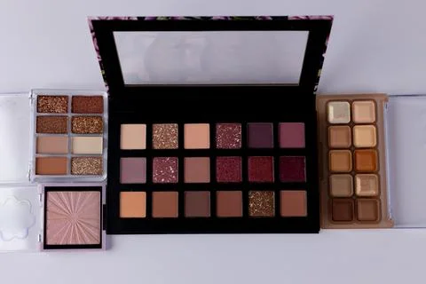 An array of exquisite eyeshadow palettes showcasing a stunning variety of colors Stock Photos