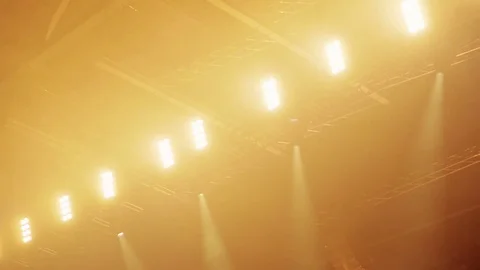 Array of lights flashing in big concert hall, then fading to black Stock-Footage 82724904