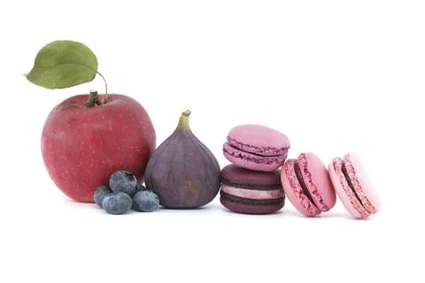 Array of macaroons and fruits isolated on white background. Full depth of field Foto stock