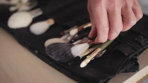 Array of Makeup Brushes for a Beauty Routine on Display Vidéo 321678480