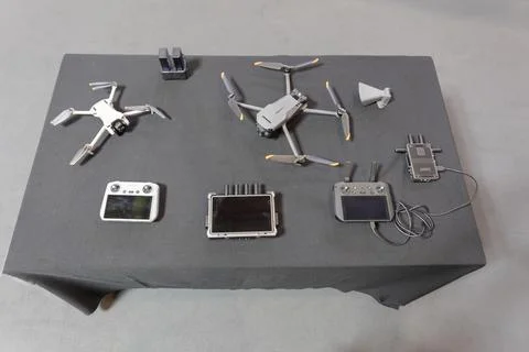 Array of metal components on a white table. Fotos de archivo