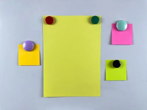 Array of notes attached to whiteboard with magnets suitable for managing task Stock Photos