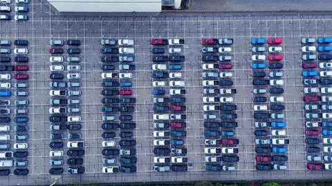 Array of parked vehicles occupying lot, representing transportation, logistics Stock Footage 336024534