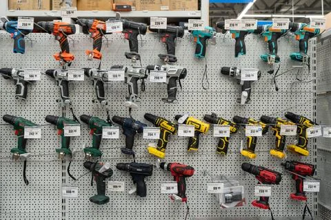 Array of power drills and cordless screwdrivers. Minsk, Belarus - june 26, 2022 Stock Photos