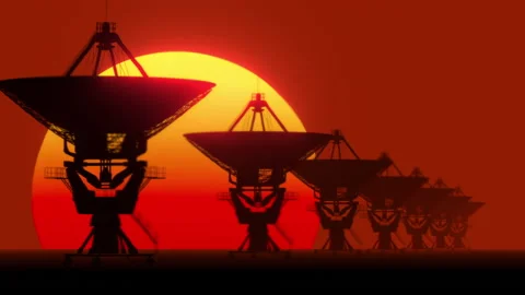 Array of Radio Telescopes with Setting Sun and Heat Distortion - 3D Video stock 140703974