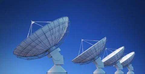 Array of satellite dishes or radio antennas against blue sky. 3D rendered ill Stock Photos