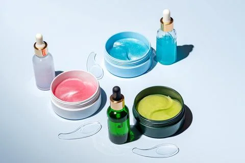 An array of skincare products, including creams and serums, artfully arranged Stock Photos