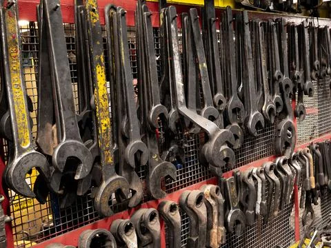 Array of tools visible on a wall display at a hardware store 스톡 사진