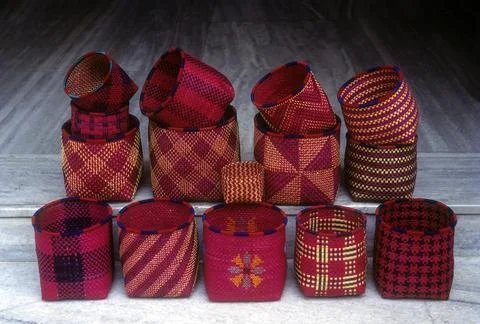 Array of traditional palm leaf baskets most of them made with dyed strips Tamil 写真素材