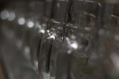 Array of transparent glass beer mugs at a bavarian folk festival or fairy ready Stock Photos