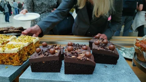 Array variety of delicious desserts on table 4k Video stock 94379048