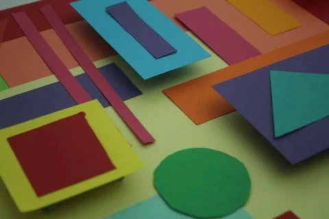 Array of vibrant colored sheets of paper layered in an organized way 스톡 사진