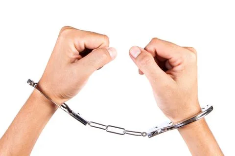 Arrested man in handcuffs isolate with white background. Stock Photos