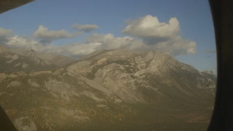 Arrigetch Peaks Mountain Range from Inside Float Plane Stock Footage 121640182