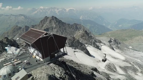 Arrival of a cable car on a mountain summit, Verbier, Switzerland Stock Footage 101578262