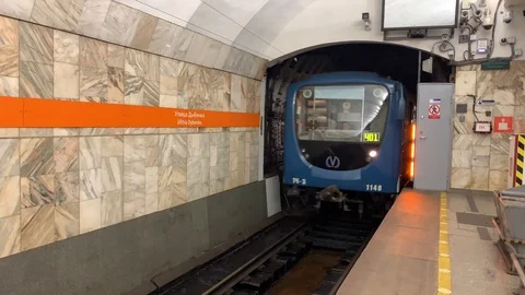 Arrival of an empty metro train to the starting station Dybenko Street Stock-Footage 115357255
