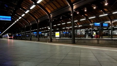 The arrival of a high-speed train to the railway station Stock Footage 95649397