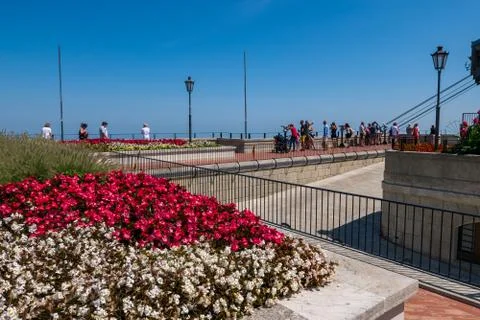Arrival of the San Marino cableway while tourists admire the spectacular view Stock Photos