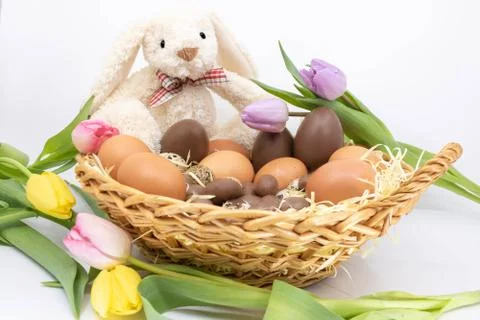 Arrival of Spring and Easter - Chocolate tulips eggs and Easter bunny Stock Photos