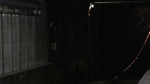 Arrival of the subway train. Passengers enter and leave old underground carriage Stock Footage 73684609