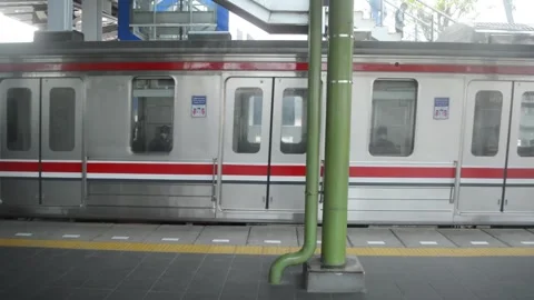 The arrival train in a station Stock Footage 253987526