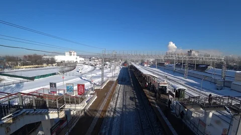 Arrival of the train to the suburban platform Stock Footage 88999549