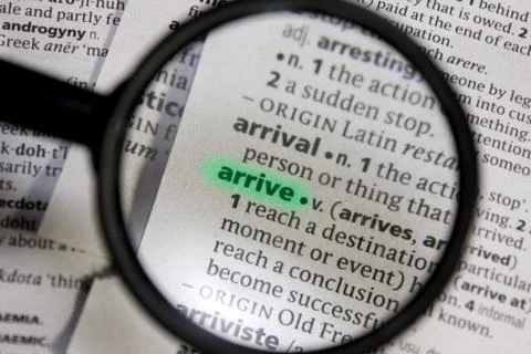 Arrive word or phrase in a dictionary. Stock Photos