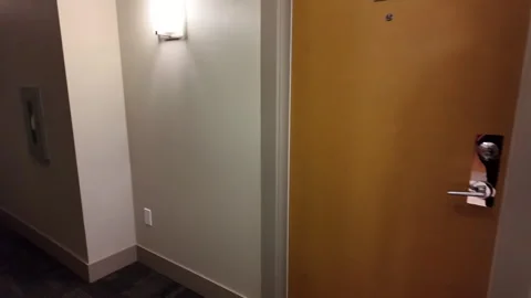 Arriving at Apartment 1003: Elevator Doors Open to Reveal the Entrance 스톡 동영상 283321222