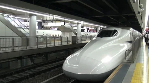 Arriving bullet train at Tokyo station, high speed travel in Japan Stock Footage