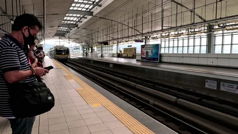 Arriving Train on LRT Line 2 Antipolo Station Philippines Stock Footage 234371306