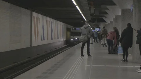 Arriving train at Waterloo plain subway station in Amsterdam [FLOG Flat profile] Stock-Footage 106943091