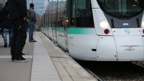 Arriving at the tram station Stock Footage 74165400