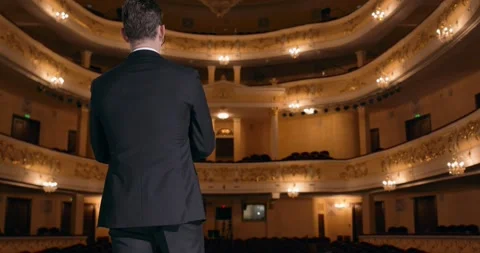 Arrogant selfish actor clapping hands, standing with raised arms Stock Footage 259610973