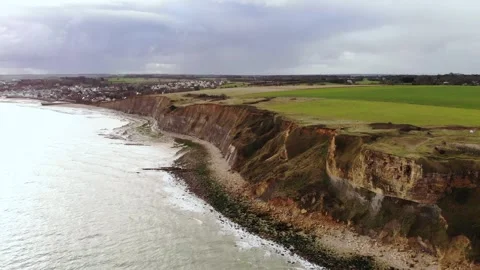Arromanches les Bains D-Day landing site Cap Manvieux cliffs and Gold Beach.. Stock Footage 341883223