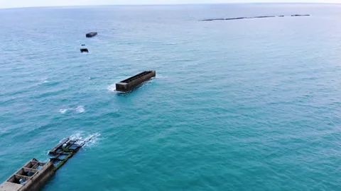 Arromanches les Bains D-Day landing site Cap Manvieux cliffs and Gold Beach.. Stock Footage 341883289
