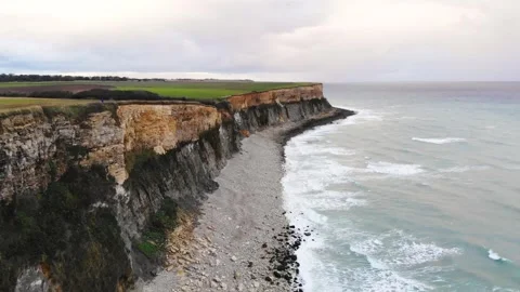 Arromanches les Bains D-Day landing site Cap Manvieux cliffs and Gold Beach.. Stock Footage 341883313