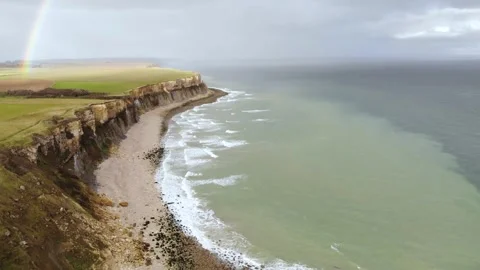 Arromanches les Bains D-Day landing site Cap Manvieux cliffs and Gold Beach.. Stock Footage 341883323