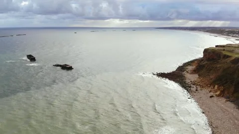 Arromanches les Bains D-Day landing site Cap Manvieux cliffs and Gold Beach.. Stock Footage 341883342