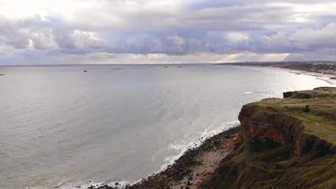 Arromanches les Bains D-Day landing site Cap Manvieux cliffs and Gold Beach.. Stock Footage 341883359