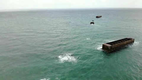 Arromanches les Bains D-Day landing site Cap Manvieux cliffs and Gold Beach.. Stock Footage 341883378