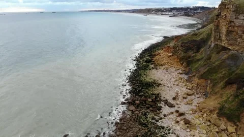 Arromanches les Bains D-Day landing site Cap Manvieux cliffs and Gold Beach.. Stock Footage 341883380