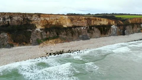 Arromanches les Bains D-Day landing site Cap Manvieux cliffs and Gold Beach.. Stock Footage 341883390