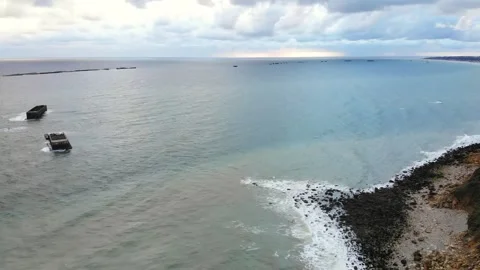 Arromanches les Bains D-Day landing site Cap Manvieux cliffs and Gold Beach.. Stock Footage 341883398
